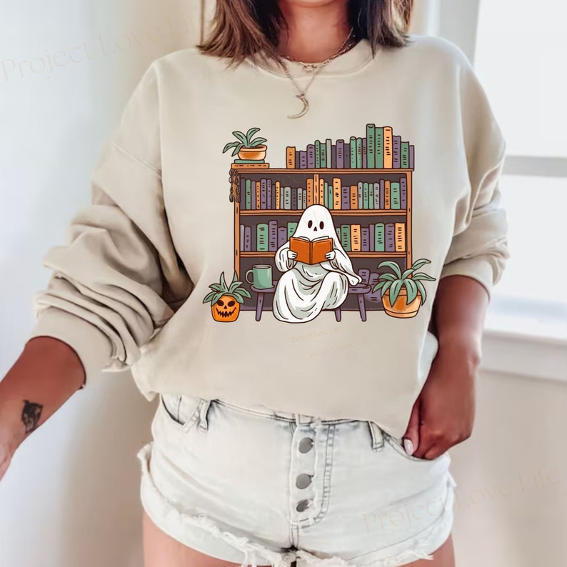 Pumpkin Witch Bookworm Sweatshirt